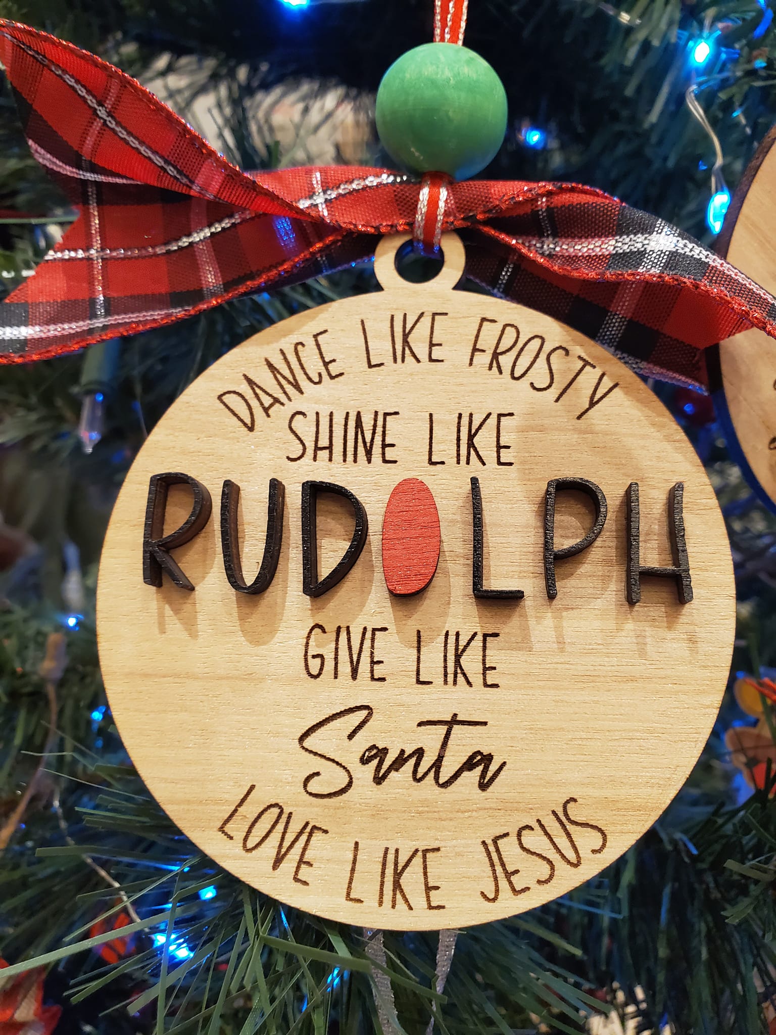 A personalized handmade wooden Christmas ornament by SIS Custom Creations