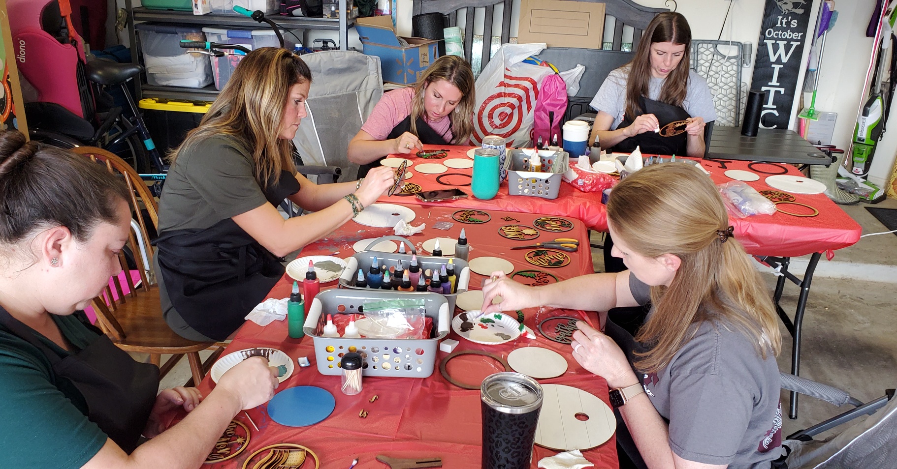 SIS paint party guests creating signs